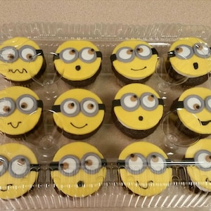 A dozen Minion Cupcake Toppers