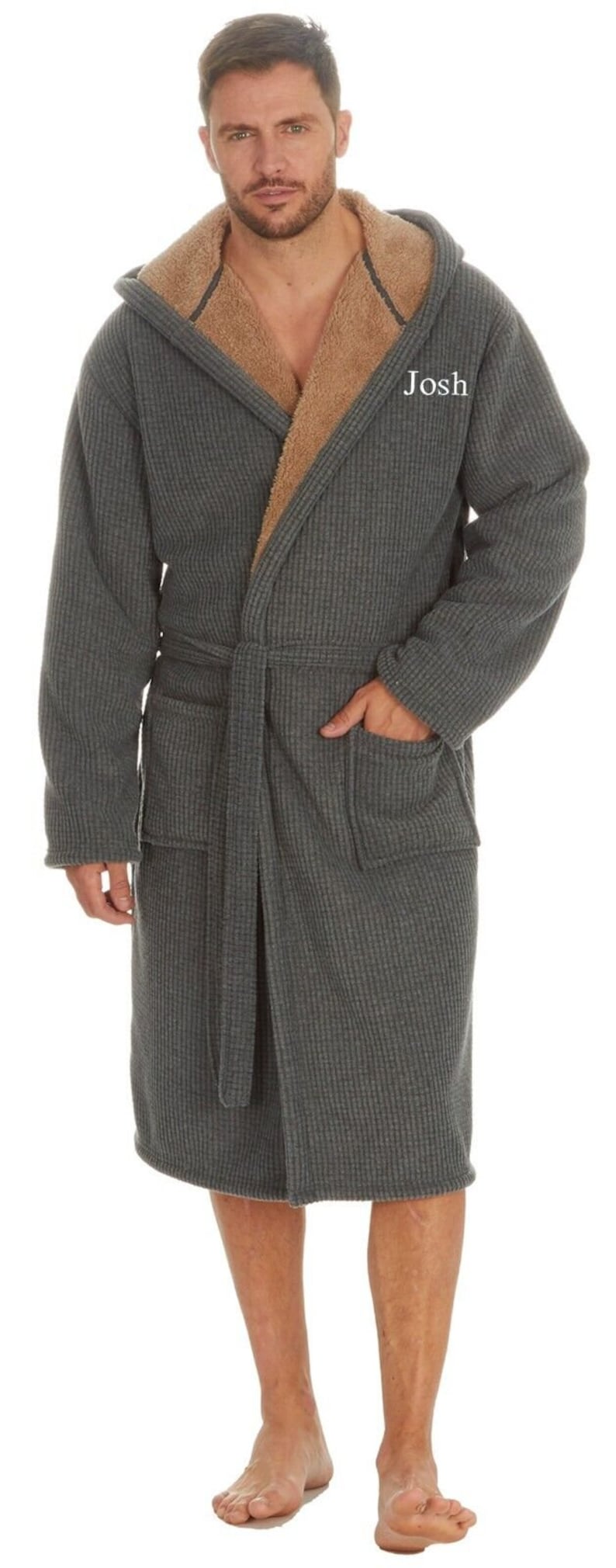 May include: A gray waffle knit robe with a brown sherpa lining and a hood. The robe has a belt and two pockets. The name "Josh" is embroidered on the robe.