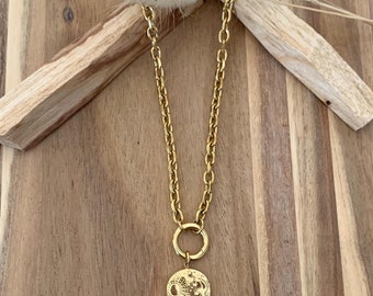 MAIA necklace, in gold-plated stainless steel, with central round clasp, moon, sun and star pendant