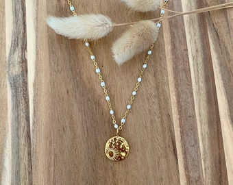 SOLIA necklace, in gold-plated stainless steel, with a moon and sun pendant, a white enamelled chain