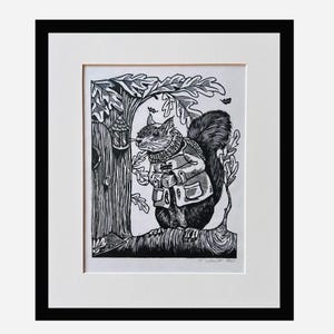 May include: Black and white woodblock print of a squirrel wearing a coat and scarf standing on a tree branch. The squirrel is looking to the left. The print is signed "M. Ashworth 2023".