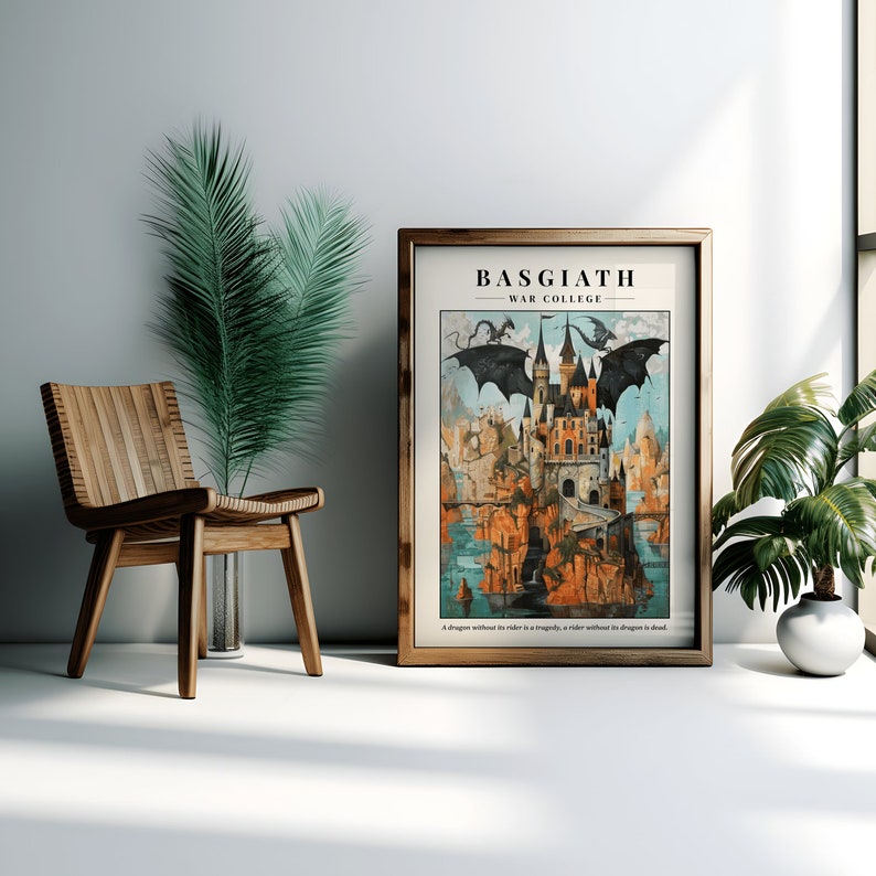 Puede incluir: Una impresi&oacute;n enmarcada de una ilustraci&oacute;n de fantas&iacute;a que representa un castillo con dos dragones negros volando por encima. El texto "Basgiath War College" est&aacute; en la parte superior de la impresi&oacute;n. La cita "Un drag&oacute;n sin su jinete es una tragedia, un jinete sin su drag&oacute;n est&aacute; muerto." est&aacute; en la parte inferior.
