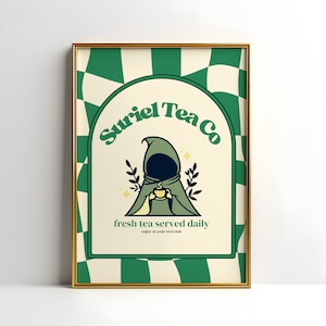 May include: A green and white chequered poster with a gold frame. The poster features a hooded figure holding a cup of tea. The text on the poster reads "Suriel Tea Co. fresh tea served daily enjoy at your own risk."