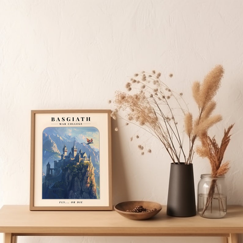 May include: A framed print of a fantasy castle on a mountaintop with a flying dragon in the sky. The text on the print reads "Basgiath War College" and "Fly... or Die."