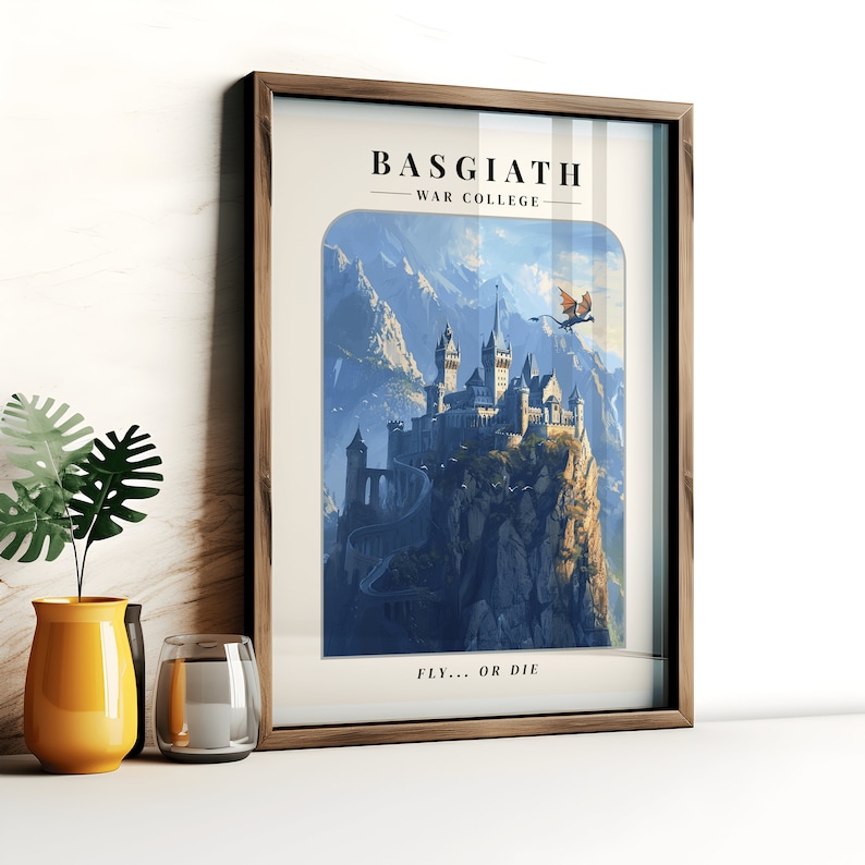 May include: A framed poster with a fantasy illustration of a castle on a mountaintop with a dragon flying overhead. The poster has the text "Basgiath - War College" and "Fly... or Die" at the bottom.