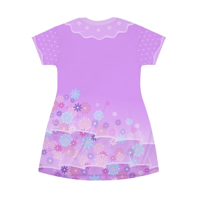 May include: A short-sleeved dress in a light purple hue featuring a scalloped collar with small white floral accents. The sleeves have a white polka dot pattern, and the lower portion of the dress displays a dense print of blue and pink flowers.