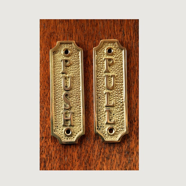 A pair of lovely solid brass antique style push and pull door signs