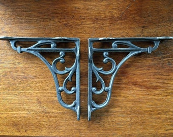 A lovely pair of cast iron Victorian style scroll shelf brackets 6 inch