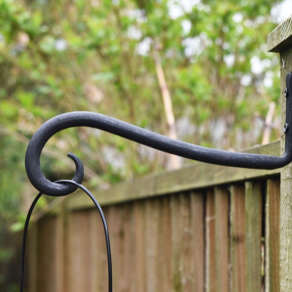 Simple curled hand made wrought iron bird feeder bracket or lantern hook