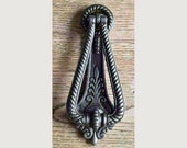 An elegant Georgian style solid cast iron door knocker doorknocker