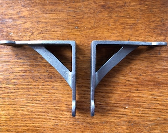 A lovely pair of small four inch Gallows arched brackets