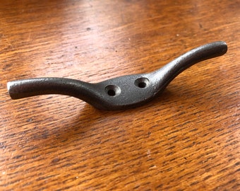 A lovely cast iron cleat hook.