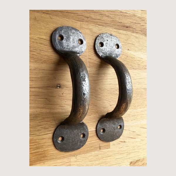 A pair of lovely simple antique style iron door or drawer handles