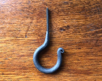 A lovely hand forged iron screw in hook