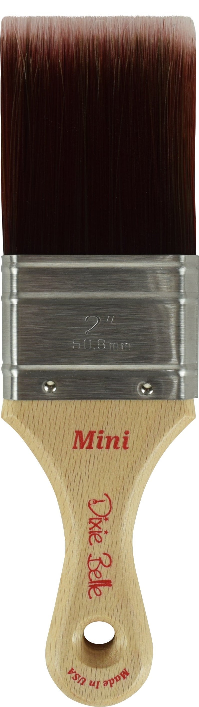 May include: A 2-inch, wooden-handled paint brush with a silver ferrule. The brush is labeled "Mini" and "Dixie Belle" and says "Made in USA".