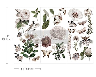May include: A sheet of decorative transfer decals featuring a variety of floral and bird illustrations. The decals include roses, butterflies, birds, and leaves in shades of pink, brown, and white. The sheet measures 12 inches by 6 inches.