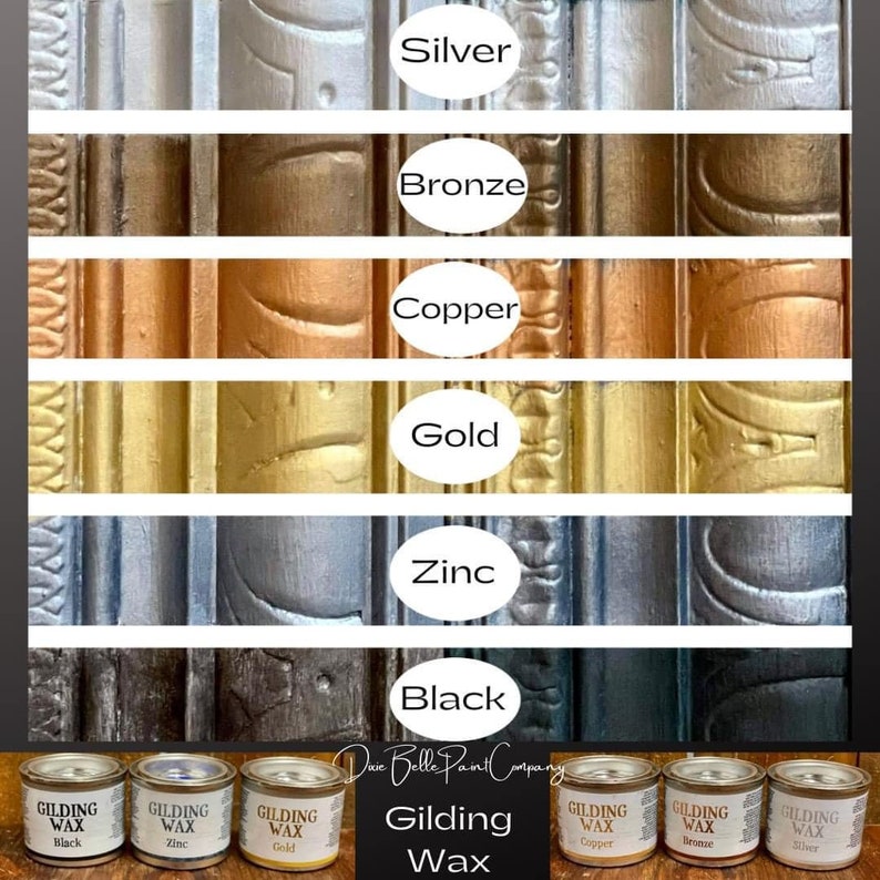 May include: A set of eight small metal tins labeled with different colors: black, zinc, gold, copper, bronze, and silver. The tins are labeled "Gilding Wax" and are arranged in a row. The text "Due Belle Paint Company" is visible below the tins.