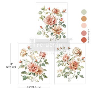May include: Three sheets of transfer paper with a floral design featuring pink and white roses, green leaves, and buds. The sheets are 8.5 inches by 11 inches.