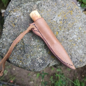 Small medieval neck knife with scabbard