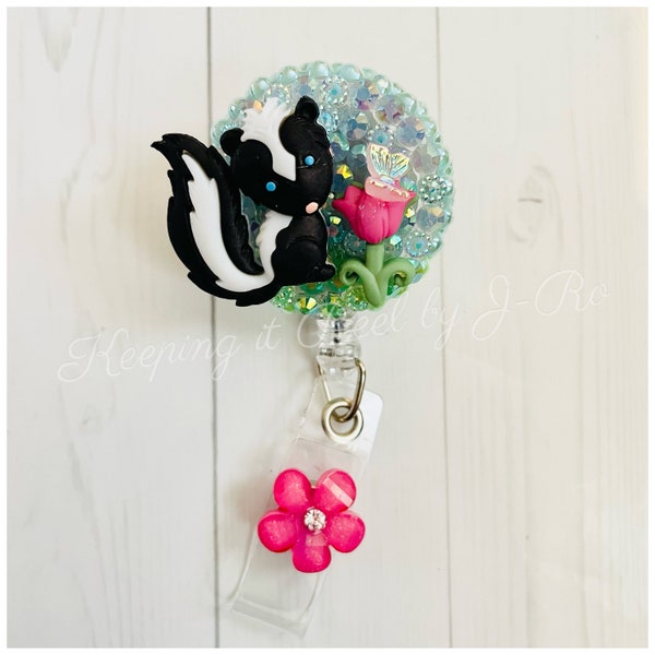 Adorable skunk flower themed badge reel