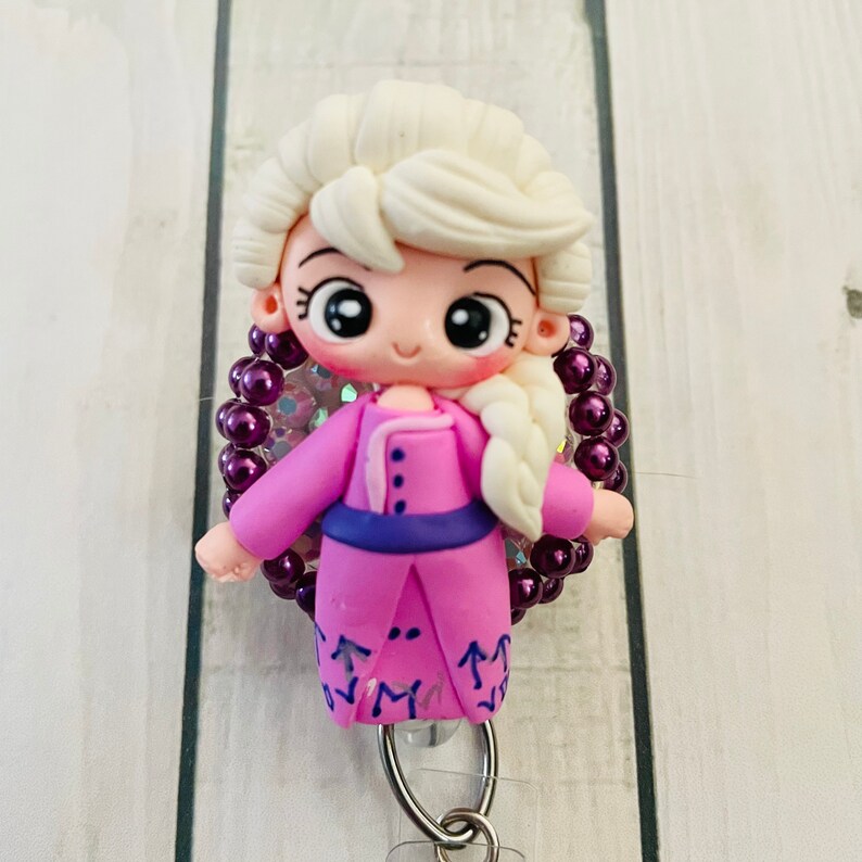Anna Elsa princess coronation themed badge reel
