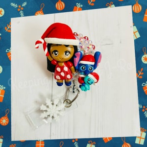 Adorable Christmas lilo Stitch themed badge reel