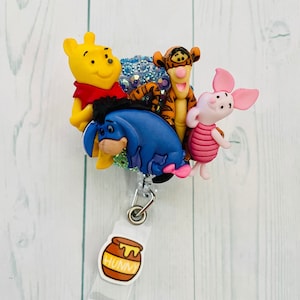 Adorable Winnie the Pooh themed badge reel