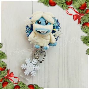 Lindo carrete de insignia de muñeco de nieve Bumble Abominable