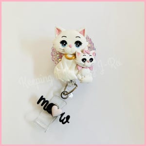 White mommy cat and kitten badge reel