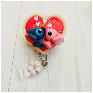 Blue alien stitch and girlfriend badge reel