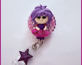 Carrete de insignias con temática de la bruja villana Madame Mim