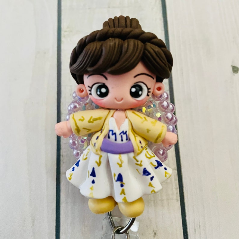 Anna Elsa princess coronation themed badge reel