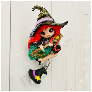 Whimsical red head witch badge reel, anime style
