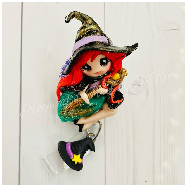 Whimsical red head witch badge reel, anime style