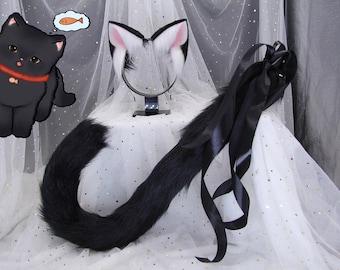 May include: A black cat tail and cat ears headband set. The ears are white with pink inner ears and black tips. The tail is black and fluffy, with black ribbons attached. A cartoon cat illustration is in the upper left corner.