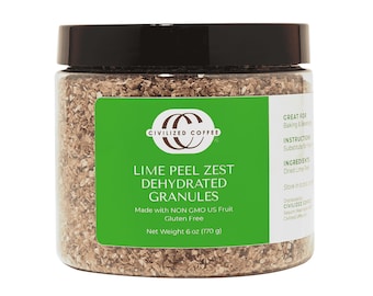 May include: A clear jar with a black lid containing lime peel zest dehydrated granules. The label reads "Lime Peel Zest Dehydrated Granules" and "Net Weight 6 oz (170 g)". The product is made with non-GMO US fruit and is gluten-free.
