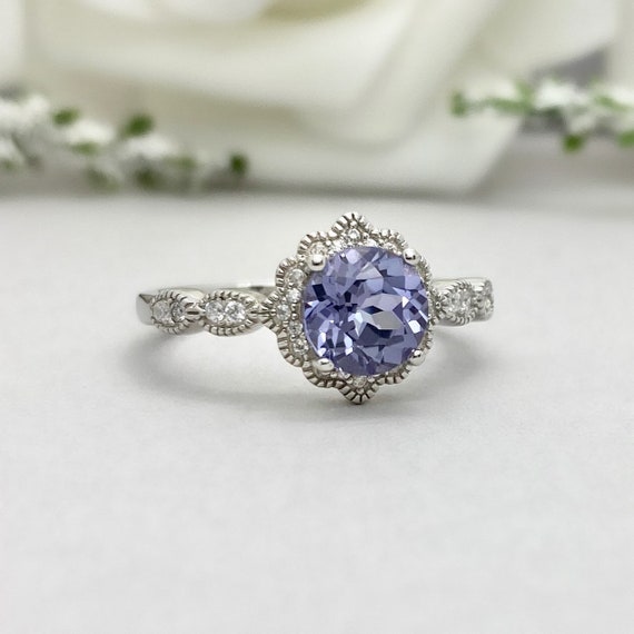 Genuine Diamond Ring with Flower Design Rhodium on Sterling Silver Genuine Diamond Ring with Flower Design Rhodium on Sterling Silver
