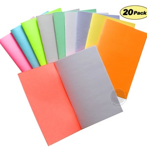 May include: A pack of 20 brightly colored paper notebooks. The notebooks are arranged in a fan shape, with the covers facing outward. The colors include pink, light blue, neon green, light gray, light green, light purple, yellow, and orange.