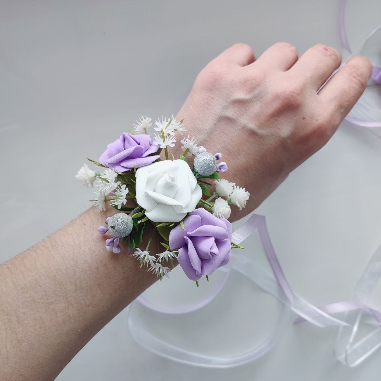 Lavender and Silver wrist corsage and magnet boutonniere in Pratt, KS