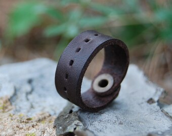 Jewel for the finger of the man with sewing line. Rustic brown leather ring. Handmade leather ring for him. Gift idea in leather.