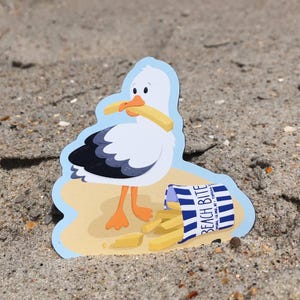 Seagull Stealing French Fries Vinyl Sticker by Earth Curious Art Co | cartoon beach bird gull eating snack decal for laptop waterbottle
