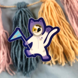 Cat-stronaut Vinyl Sticker by Earth Curious Art Co | calico cat kitten outer space exploration astronaut rocket galaxy animal decal laptop