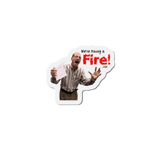 May include: A sticker featuring a cartoon image of a man in a striped shirt, holding a paper and yelling. The sticker has the words "We're having a Fire!" in red, with "sale" below.