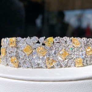 Modern art deco bracelet in 11ct multi cut light yellow diamond and 18k AU750 gold