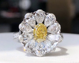 Bague cocktail marguerite en diamant Jaune Intense Fantaisie oval 1ct GIA