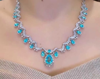 Paraiba Tourmaline Riviera Necklace 5,51ct Natural Pear Cut, Diamond Pavé 3.79ct, 18K White Gold – AIGS Certified