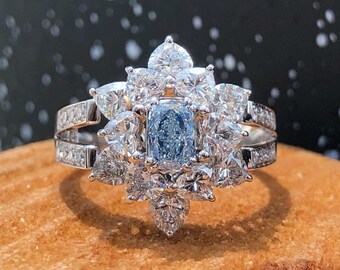 Magnifique bague flocon en diamant bleu clair GIA diamant latéraux blanc et or blanc 18k