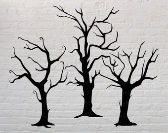 May include: Three black silhouette trees with bare branches against a white brick wall background.