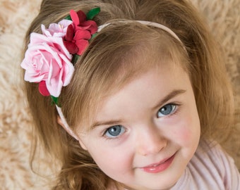 Pink baby flower headband for the first birthday. Christmas children's headband for a photo shoot. Flower crown headband for a little girl