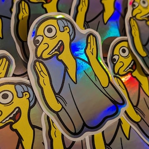 May include: A sticker featuring a cartoon character with yellow skin, a blue shirt, and a surprised expression. The character is raising both hands in the air. The sticker has a holographic finish.